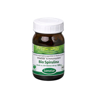 Jar of Bio Spirulina with a white cap on a white background