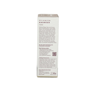 The back of a white cardboard box for 'Pflanzenharkur Canalia' herbal remedy, featuring German text, a QR code, and the brand 'Akzente Naturheilmende GmbH' at the bottom, shot against a plain white background.